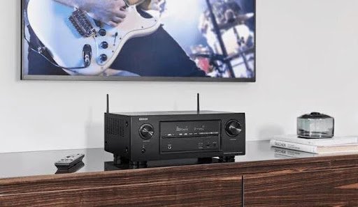 Home theatre setup with AV receiver being diagnosed for common issues